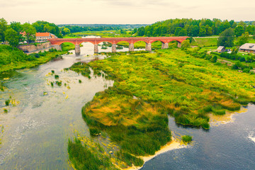 Beautiful panoramic aerial view photo from flying drone to Venta Rapid waterfall,the widest...
