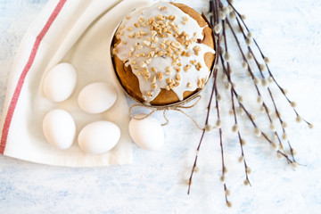 Baking / cooking ingredients. Eggs, kitchen textiles on a soft blue concrete background Easter cake. Cookie, pie, or cake recipe layout. The view from the top. Mortgage The Apartment.