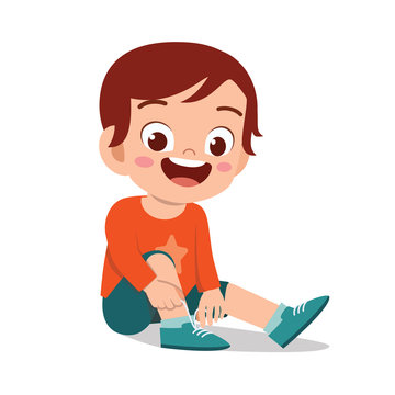 happy cute little kid boy tie shoe shoelace