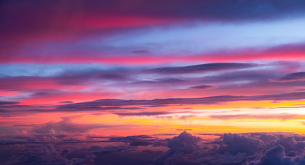Fototapeta premium Sunset sky background vivid color sky background. view from plane.