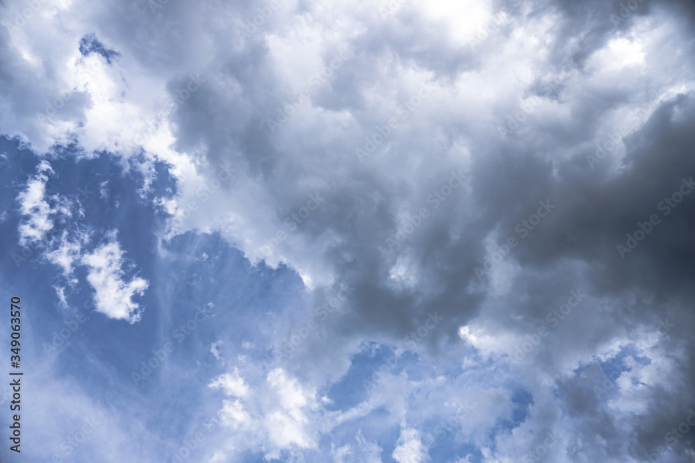 Wall mural terrible thunderclouds from the side of a plane. gloomy epic clouds. background image in a dark gray
