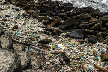 garbage on the beach, plastic waste and pollution on the beach