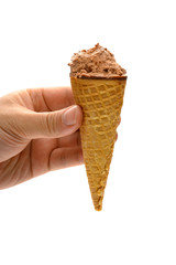 hand holding a  chocolate flavor ice cream cone with couple of bites on white with clipping path