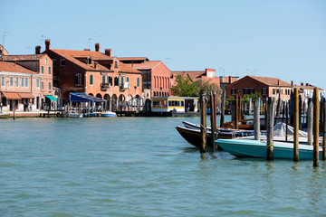 View of  Murano Pier and channel in Venice, Italy. - obrazy, fototapety, plakaty