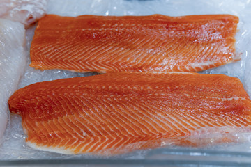 Salmon fillet on ice in a supermarket