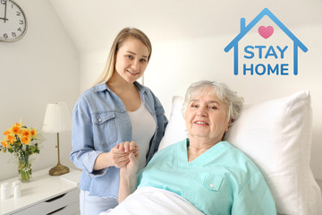 Young woman with her grandmother at home. Concept of coronavirus epidemic