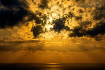 Landscape sunrise on Hon Chong cape, Nha Trang, Vietnam. Travel and nature concept. Morning sky, clouds, sun and sea water
