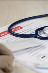 Laboratory scientist performs a rapid diagnostic test (rdt) for antibodies to detect the presence...