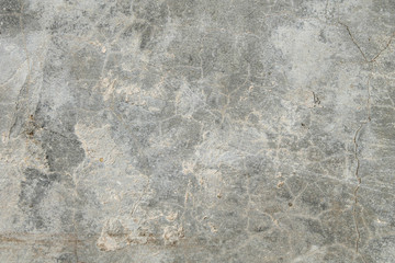 Cracked concrete texture. Faults and cracks on the stone surface.