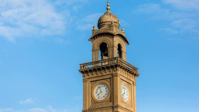 Timelapse of 100 year old Indo-Saracenic Clock Tower (also known as Dodda Gadiaya and Silver Jubilee Clock Tower) with numerals in Kannada language at Mysore, Karnataka, India