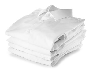 Stack of clean clothes on white background