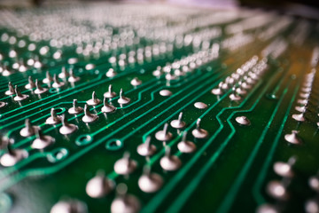 Extreme detailed view of printed circuit board and components in the electronic devices.