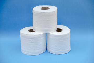 Toilet paper isolated on a blue background