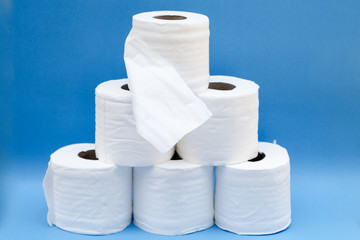 Toilet paper isolated on a blue background