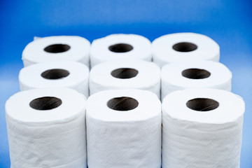 Toilet paper isolated on a blue background