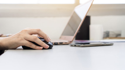 Woman teleworker using laptop and internet work from home, working online. 