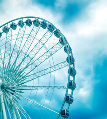 Ferris Wheel Over Blue Sky