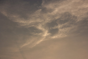 Beautiful sunset sky background with clouds