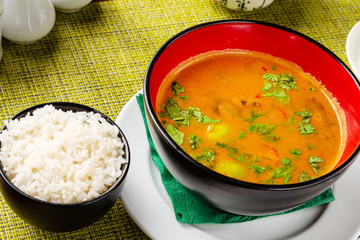Tom yum soup with rice on the table, lunch, Chinese traditional Asian food