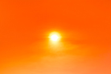 bright sun with orange color in sky
