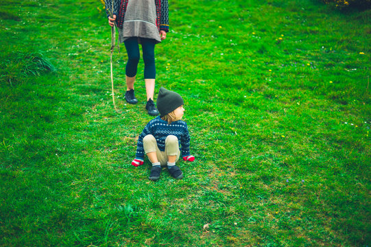 Preschooler and his mother walking in nature