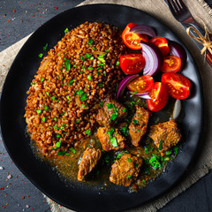 Buckwheat groats baked in the oven with beef goulash