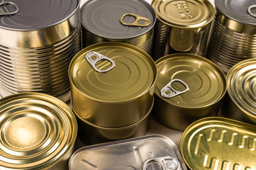 Mix of cans isolated on white background.