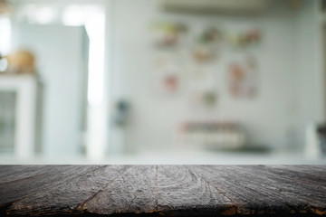 Wood desk space and blurred of kitchen background. for product display montage. business presentation.