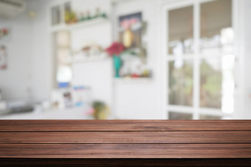 Wood desk space and blurred of kitchen background. for product display montage. business presentation.