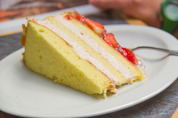 strawberry cake and sponge cake and almonds