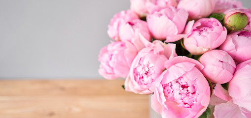Elegant bouquet of a lot of peonies of pink color close up. Beautiful flower for any holiday. Lots...