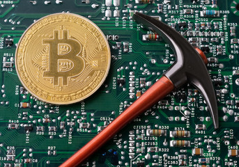 Bitcoin and Pickaxe on background of micro schemes, Cryptocurrency Concept