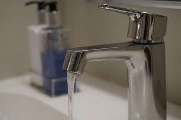 Sink Faucet Spewing out Water