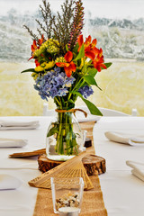 Floral arrangement in a vase on table