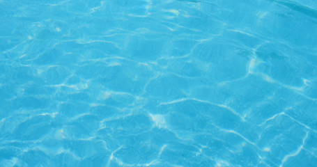Fototapeta na wymiar Swimming pool water texture in blue