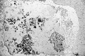 Texture of a concrete wall with cracks and scratches which can be used as a background