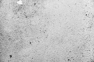 Texture of a concrete wall with cracks and scratches which can be used as a background
