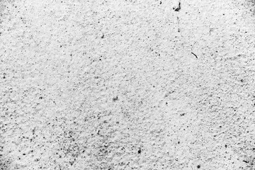 Texture of a concrete wall with cracks and scratches which can be used as a background