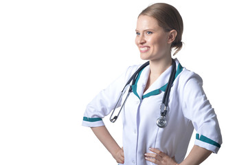 Portrait of female happy doctor posing on white
