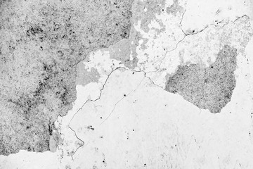 Texture of a concrete wall with cracks and scratches which can be used as a background