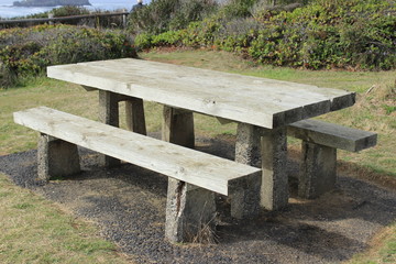 Old table and benches made of thick boards. USA.