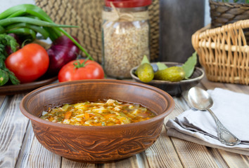 Soup kharcho. Thick beef soup with rice, tomatoes, carrots, peppers and spices. A traditional dish of Georgian cuisine.