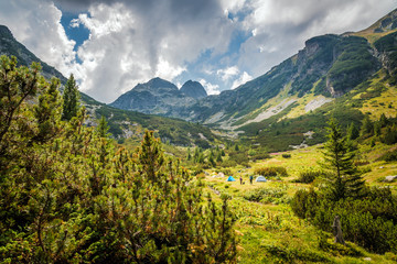 Fototapeta na wymiar Beautiful mountain scenery and camping tents. Rila mountain , Bulgaria. 
