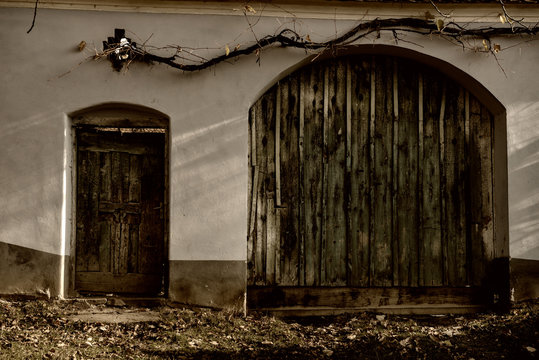 wooden gate and the entrance door of the country