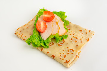 Pancake with chicken and tomatoes