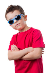 Confident cool boy with red dress shirt and sunglasses, isolated on white background