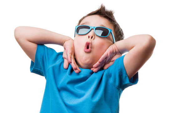 Cheerful little boy in sunglasses express surprised face, isolated on white background