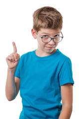 Boy in glasses showing thumbs up gesture, isolated on white background