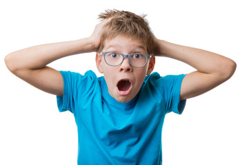 Terrified blond hair boy in glasses clutched at his head and screaming, isolated on white background