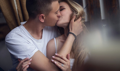 Surprise! Beautiful romantic couple in cafe. Young man is coming of the date to his beloved in caffe. Feel of happiness.